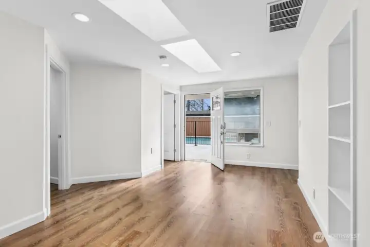 Family room looking to pool area with natural light