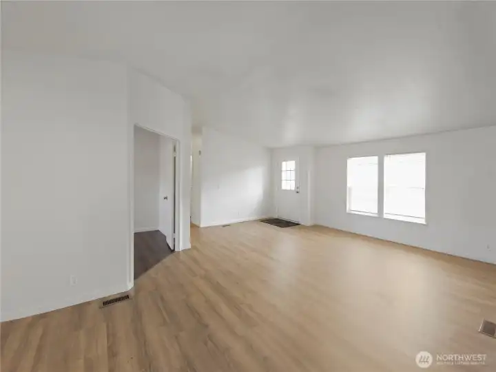 Second angle of the main living area highlighting the generous space for gathering, relaxing, and entertaining.