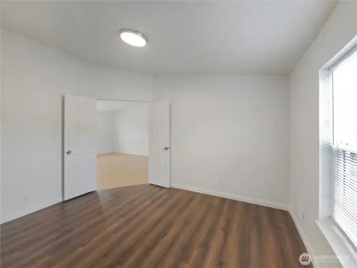 Versatile bonus room perfect for a home office, media room, guest space, or optional fourth bedroom.