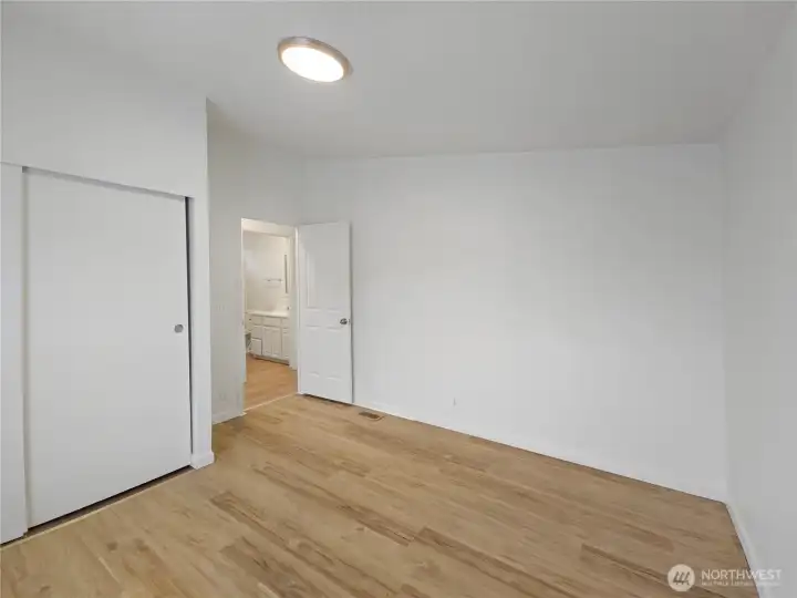 Bedroom 3 with ample closet storage and practical proximity to the full hall bath.