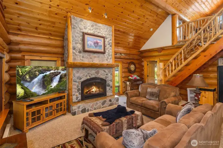 Great Room showing access to main floor bedroom and stairs to Loft