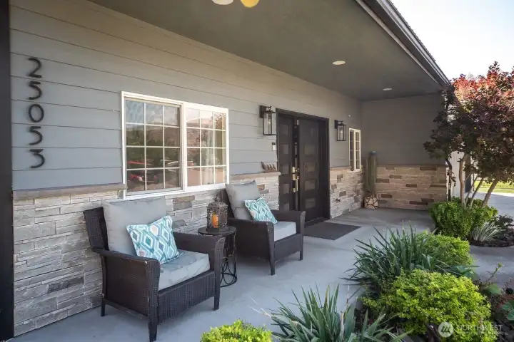 Cover patio in the front. Fun to watch all the activity that goes by.