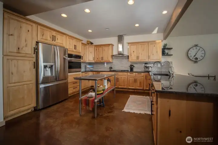 View of the kitchen. Knotty alder cabinets.