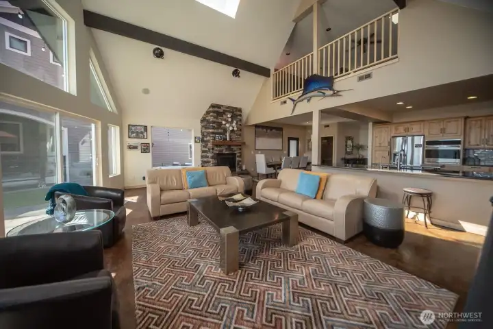 Large living area, with the propane fireplace and above loft.