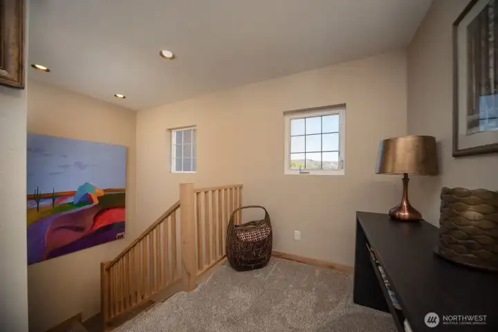 Landing at the top of the stairs to the second level.