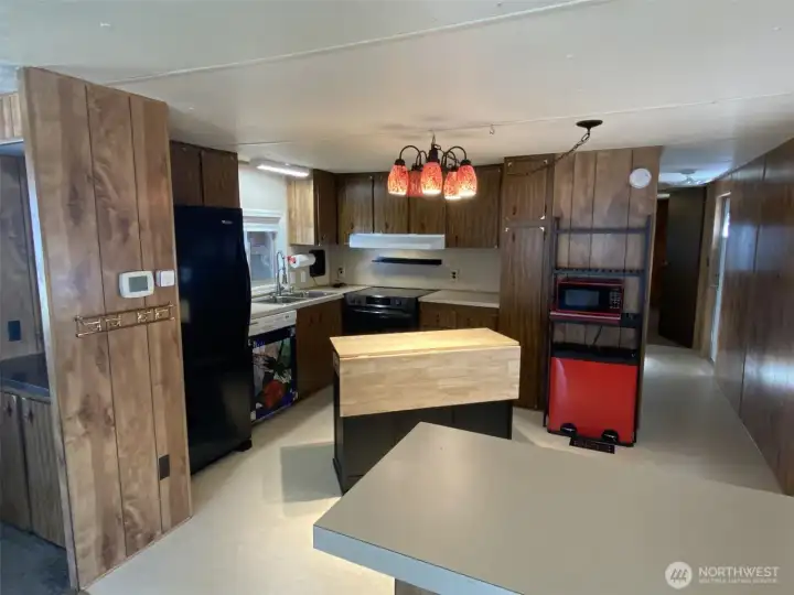 Kitchen with newer range and fridge