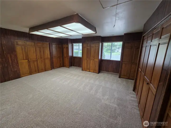 Great room just off primary. Notice all of the storage closets in this space.