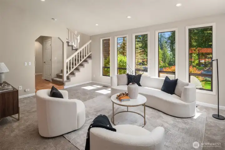Living area in front of home off the entry doorway