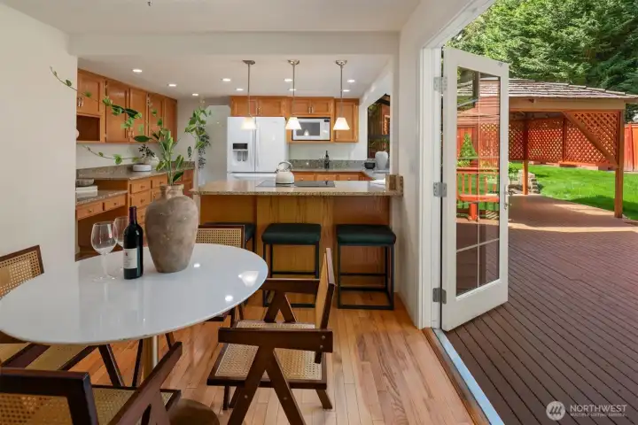 Kitchen + eating space with indoor/outdoor convenience