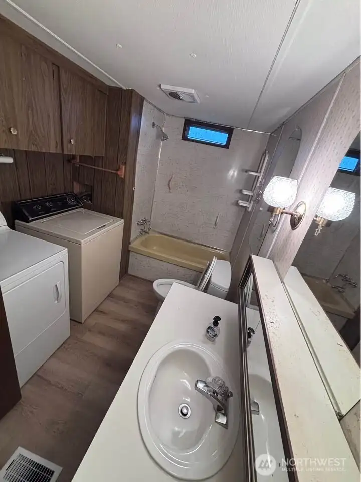 Bath has washer & Dryer