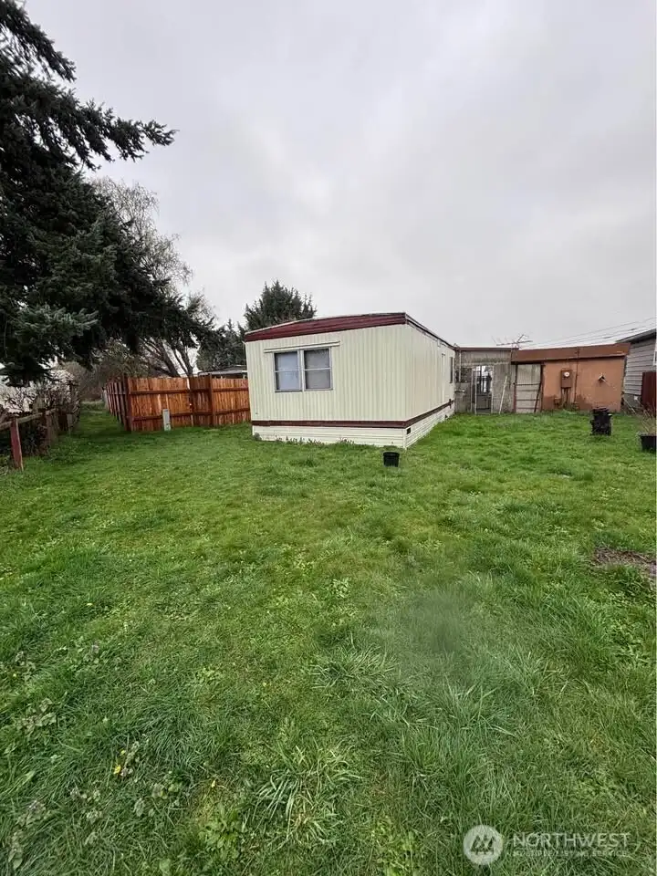 Back of house with laege yard area