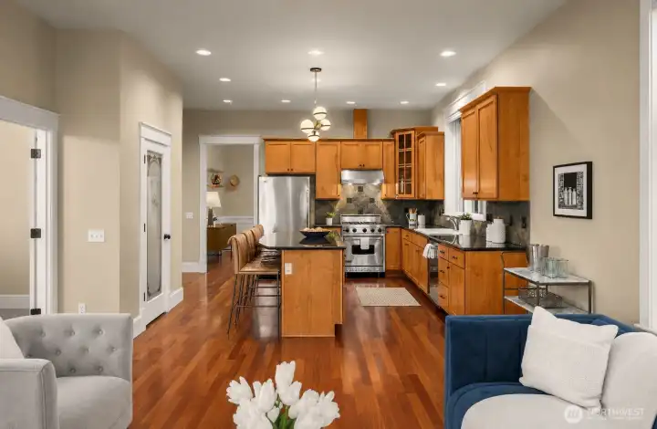 This main level features a bedroom/office off to the left of the frame. This main level features a bedroom/office off to the left of the frame.