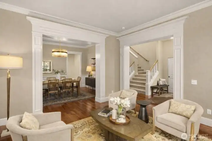 The formal living room is located just off the front entry and leads to the dining room and main hallway. The formal living room is located just off the front entry and leads to the dining room and main hallway.