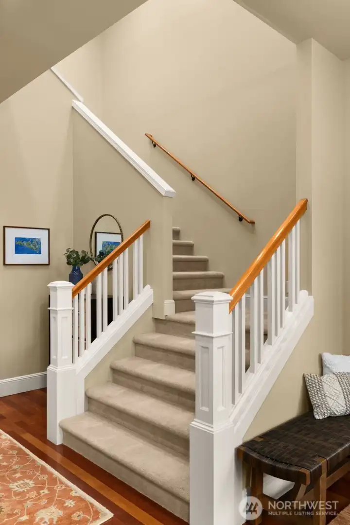 Head upstairs to find 3 bedrooms on the same floor, laundry, bathrooms, and storage. Head upstairs to find 3 bedrooms on the same floor, laundry, bathrooms, and storage.