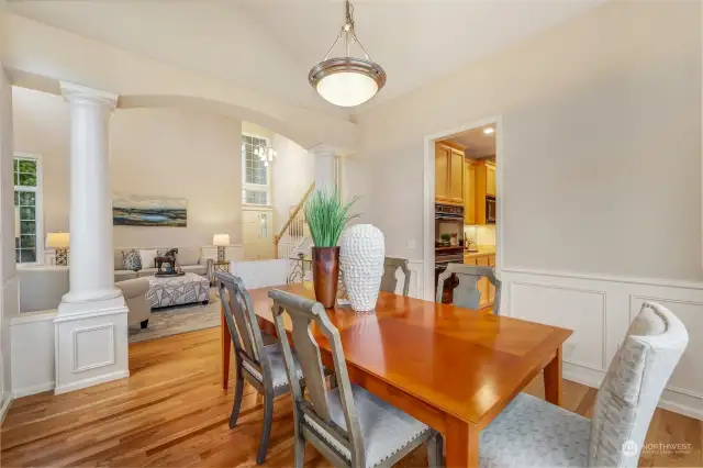 Conveniently located next to the kitchen, the dining room allows for effortless entertaining. The combination of high ceilings, refined trim work, and natural light makes this a welcoming and sophisticated space.