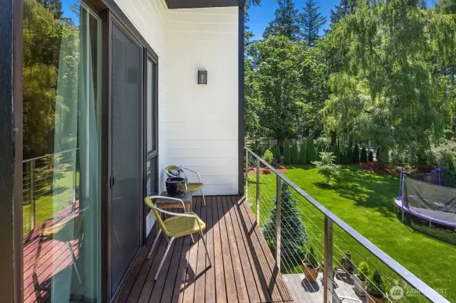 Just imagine sipping morning coffee from your private deck, surrounded by woods and your verdant grounds.