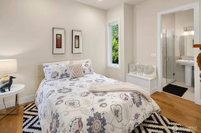 This main floor en-suite bedroom can flex to fit your lifestyle - guest retreat, home office, workout space, or...?