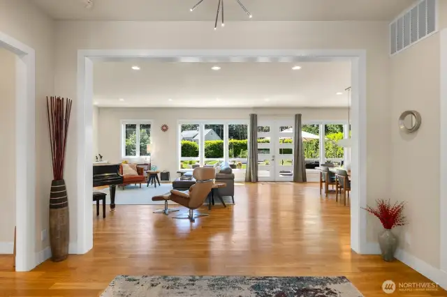Step into the expansive entryway, and you're treated to big open views of the lush grounds.