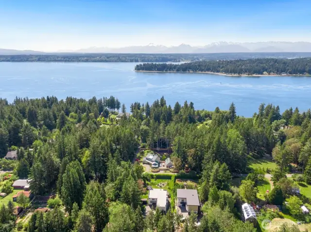 From the aerial view, note the proximity to the water - with the peninsula and the Olympic Mountains beyond.