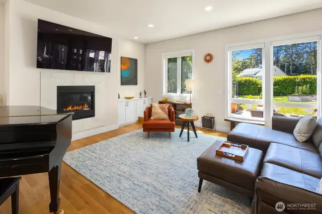Flexible open space for living with a wall of windows to the private yard.