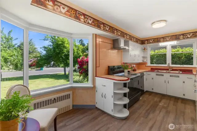 Great breakfast nook with bay window to sit and relax with a cup of coffee.