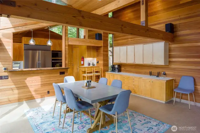 Custom Maple cabinetry blends with the warmth of the cedar walls