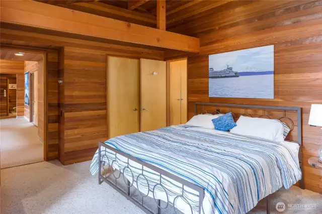 The primary bedroom has vaulted ceilings.