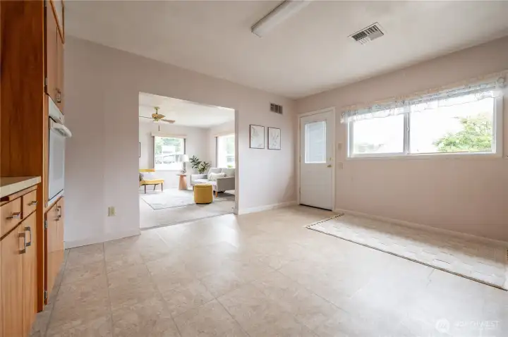 Large space in the kitchen perfect for a kitchen table gathering space or Island