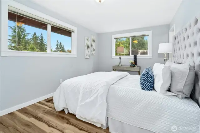 Enjoy the custom trim around the primary bedroom windows
