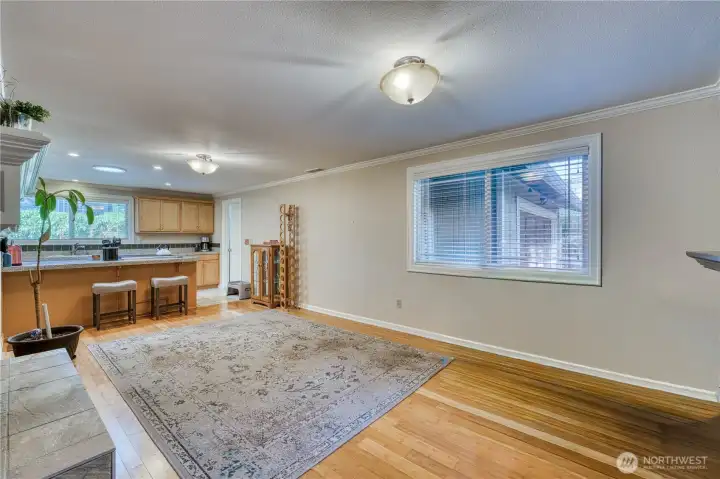 From entry looking into the secondary living space or formal dining room looking into the kitchen