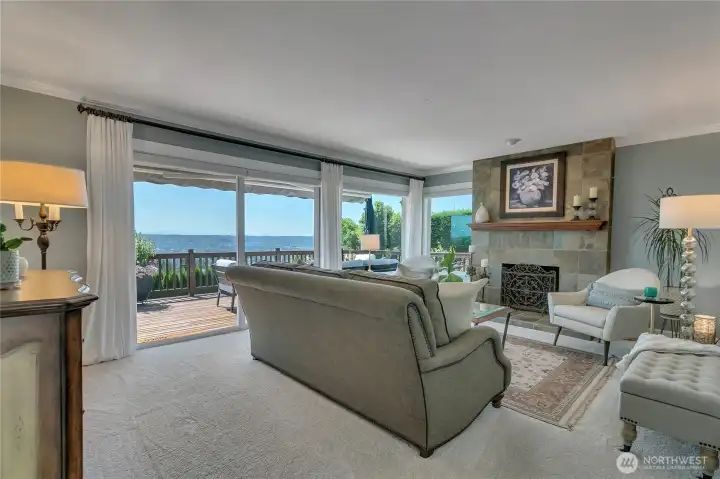 Relax by the fire in the bright living room