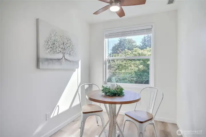 Nook with new ceiling fan. Windows on both sides of condo for great natural light.