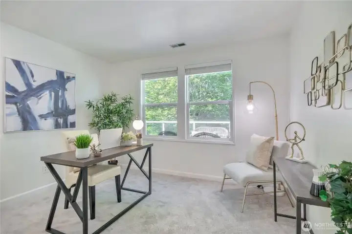 2nd bedroom is large enough to be used as a guest bedroom and office. Great views to deck. New carpet.