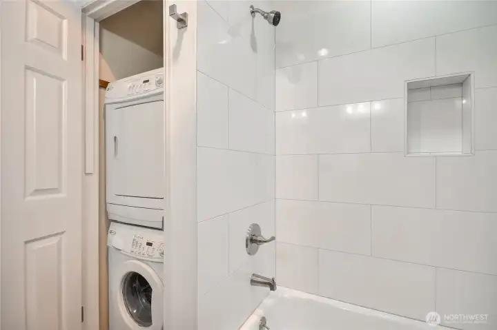Hall bath with remodeled tiled shower. Full bathroom.