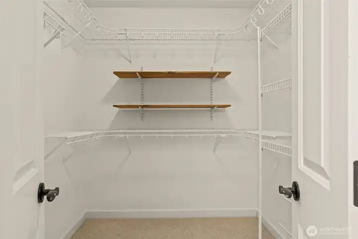 Primary walk-in closet.