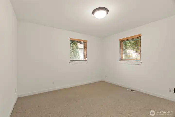 One of three additional bedrooms.