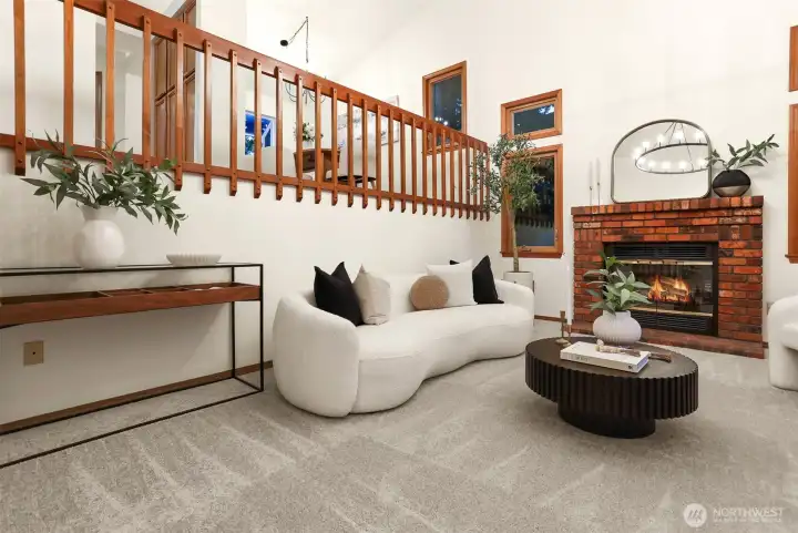 Front ceramic tile entry opens to living room with soaring ceilings.