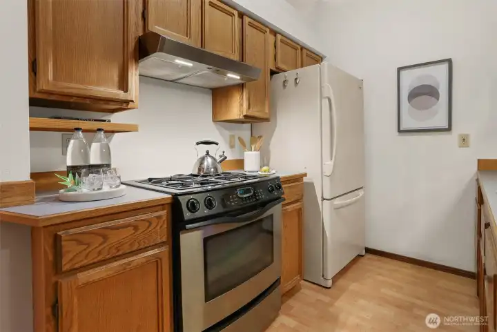 Kitchen boast gas cooking.