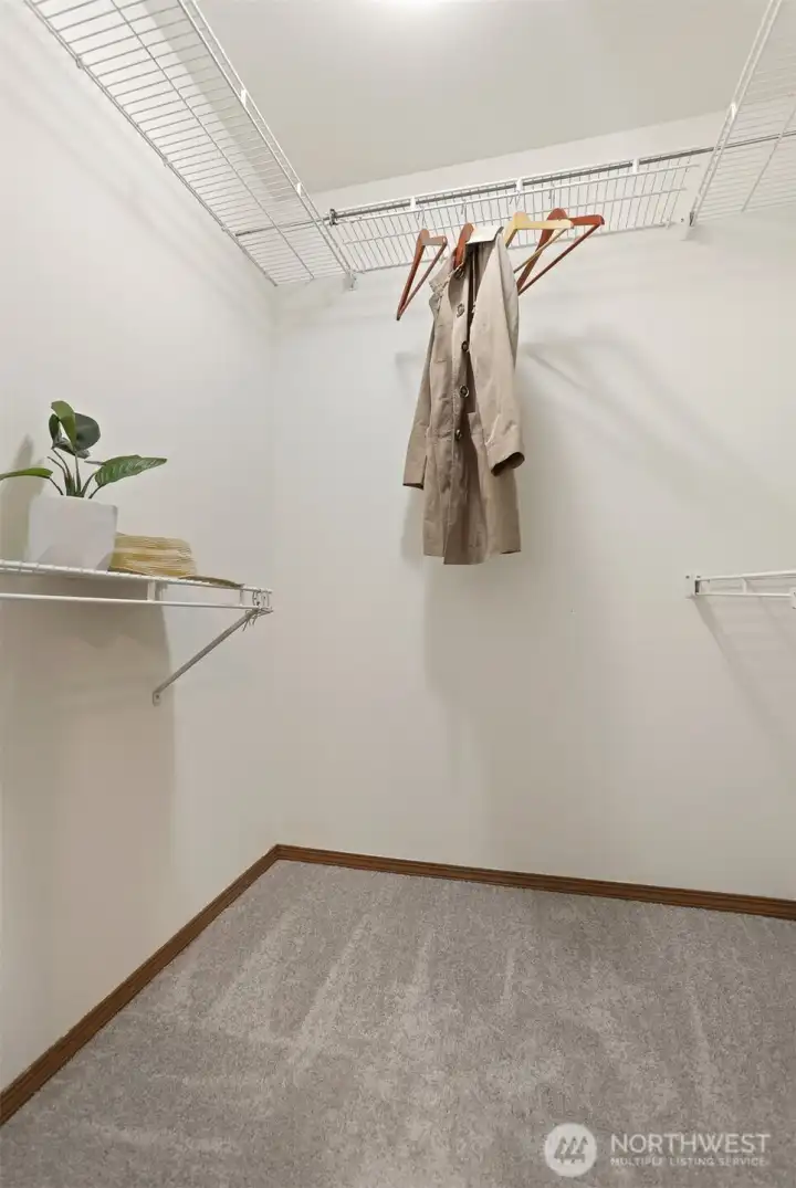 Primary walk-in-closet.