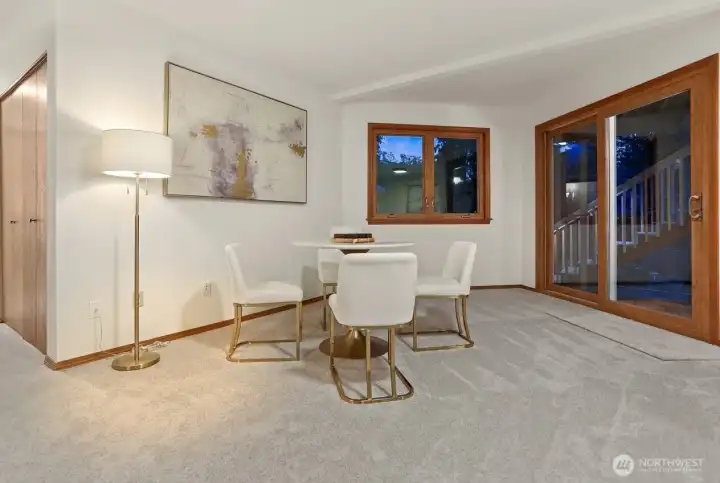 Lower level family/rec room has sliders to rear yard.