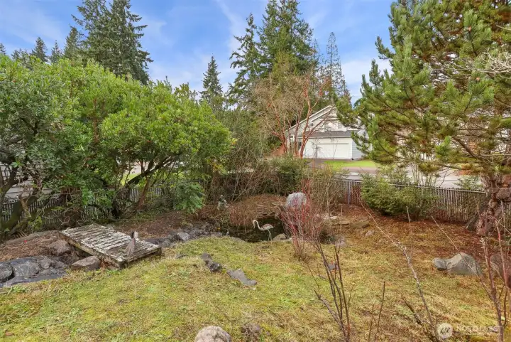 Front yard has pond and is considered a wildlife sancuary.