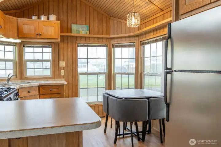 Front windows look over parking and green space