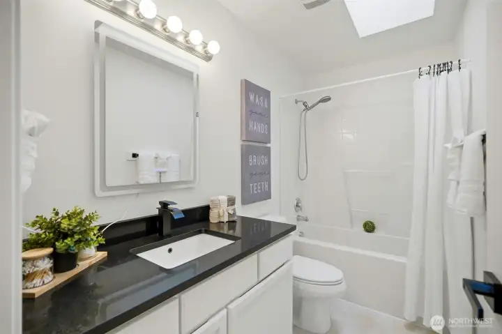 Main bathroom with skylight