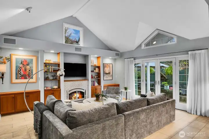 Second living room at back of house. Easy access to back patio.