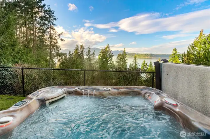 Imagine relaxing at the end of the day in your hot tub looking at a gorgeous sunset over the Olympic mountains...with complete privacy! Imagine relaxing at the end of the day in your hot tub looking at a gorgeous sunset over the Olympic mountains...with complete privacy!