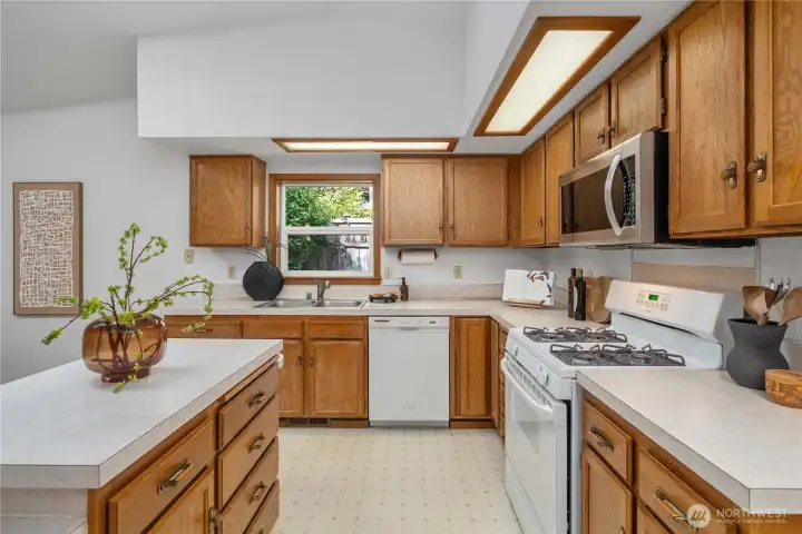 Plenty of cabinet and counter space for the chef. All appliances stay with the house.