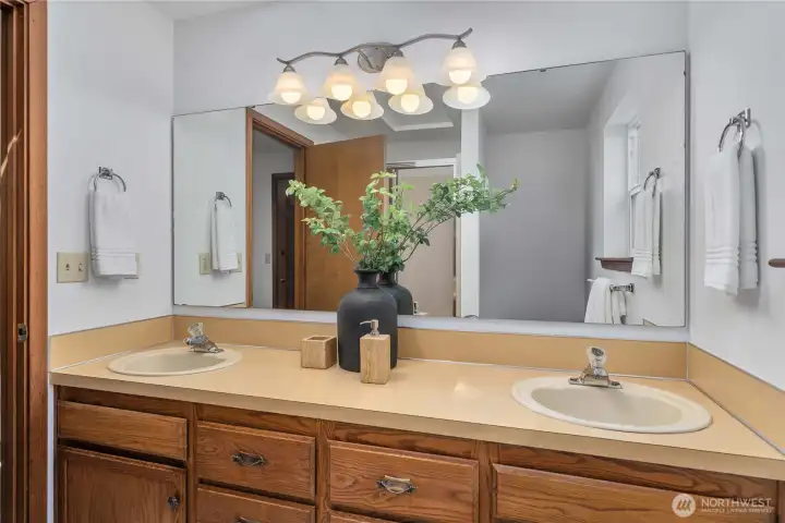 The large shower features a convenient integrated seat.