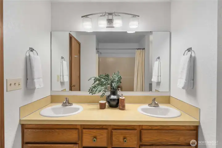 The hall bathroom also comes with a dual-sink vanity
