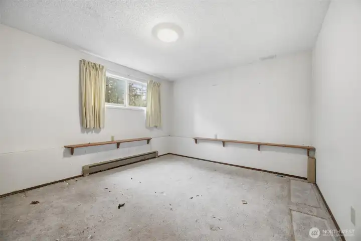 The 2nd bedroom is very spacious and looks to the rear yard.