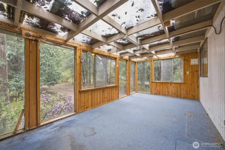 This is the sunroom that was possibly added and does have some water leaks. It is just off the kitchen.